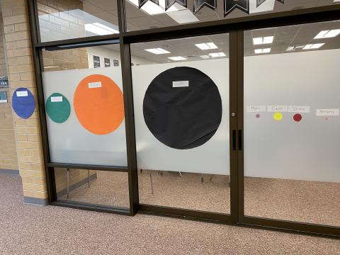 Students use the scale to hang their solar systems in the hallways of MGMS